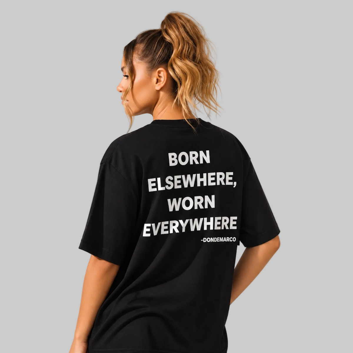 Women's Born Elsewhere Worn Everywhere black oversized tee back on model