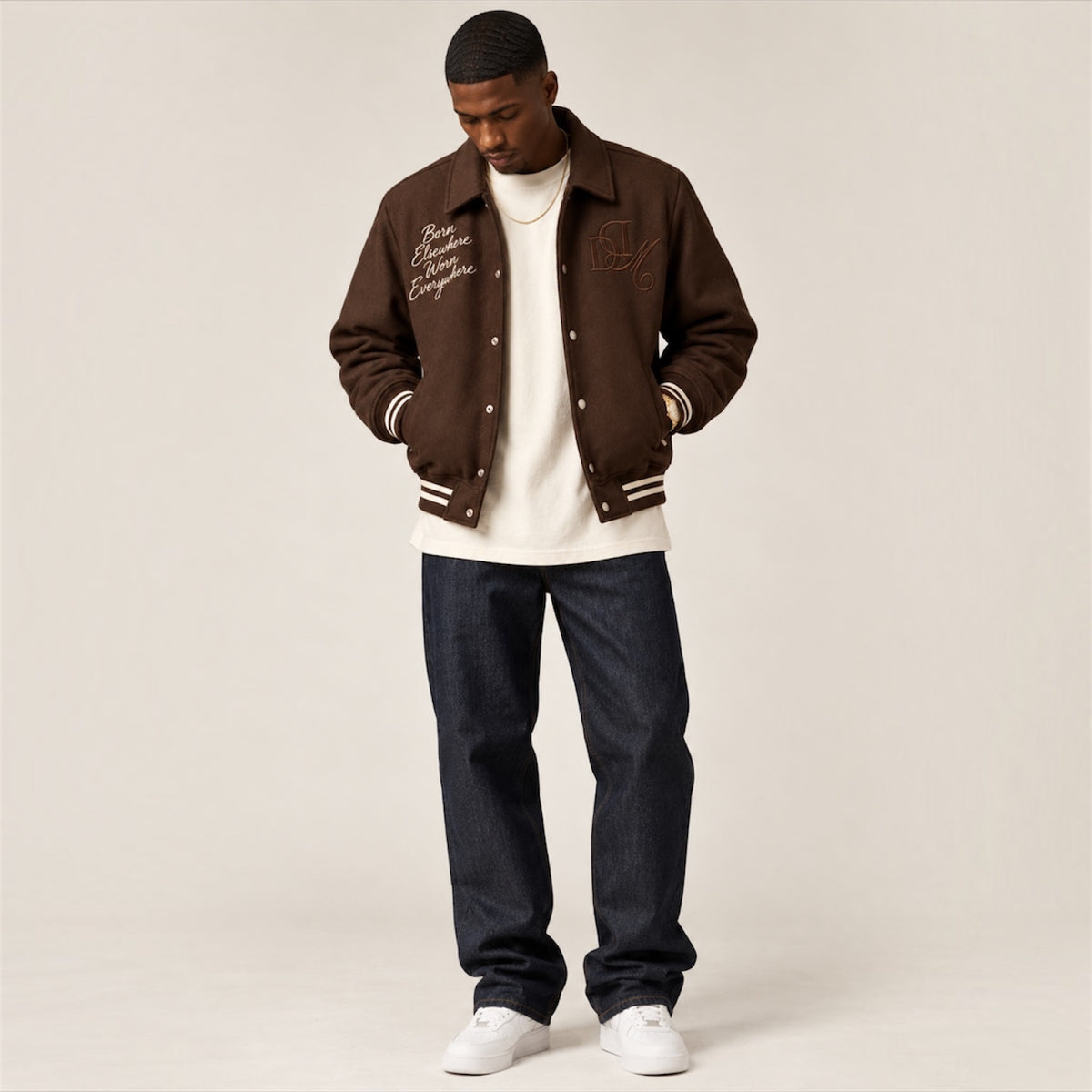 Full length model view of DonDeMarco chocolate brown varsity wool jacket
