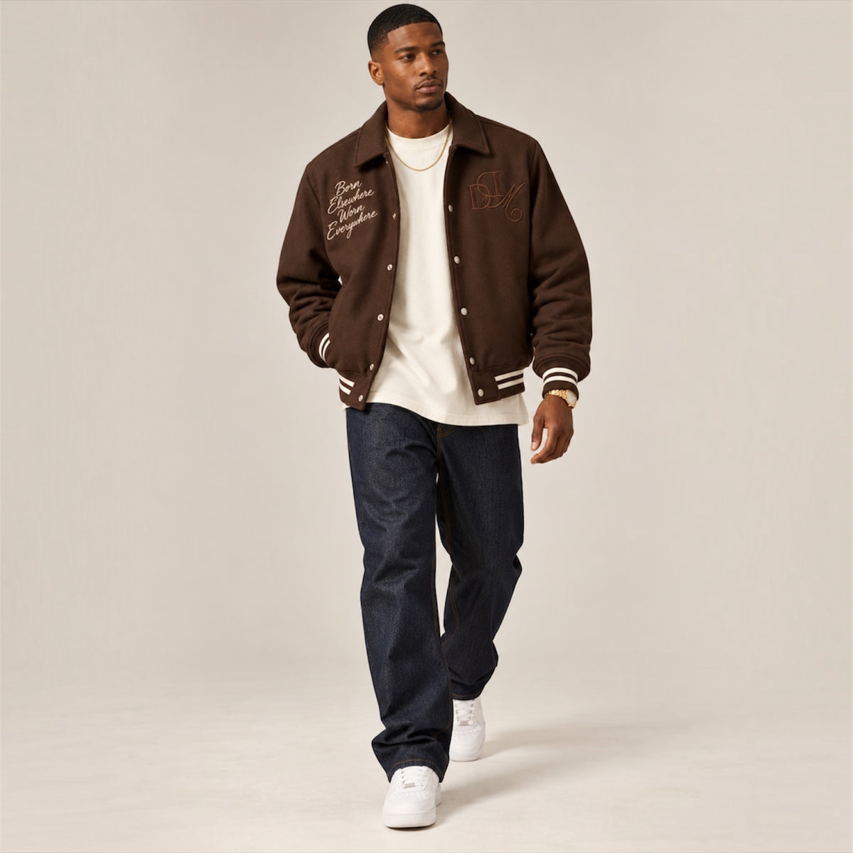 DonDeMarco chocolate brown varsity wool jacket on model walking