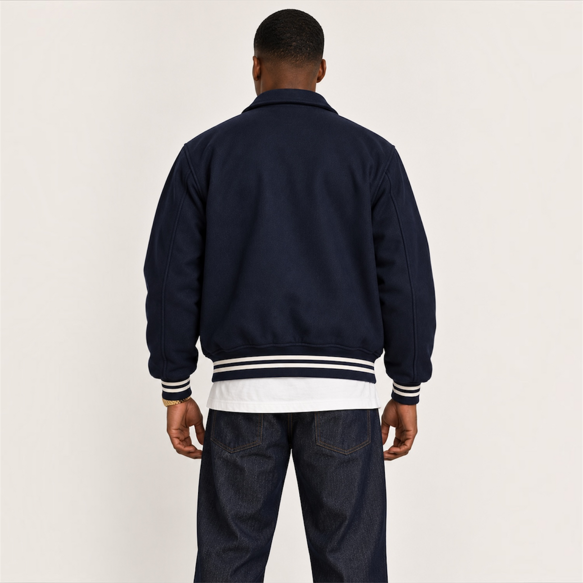 Back view of DonDeMarco navy varsity wool jacket
