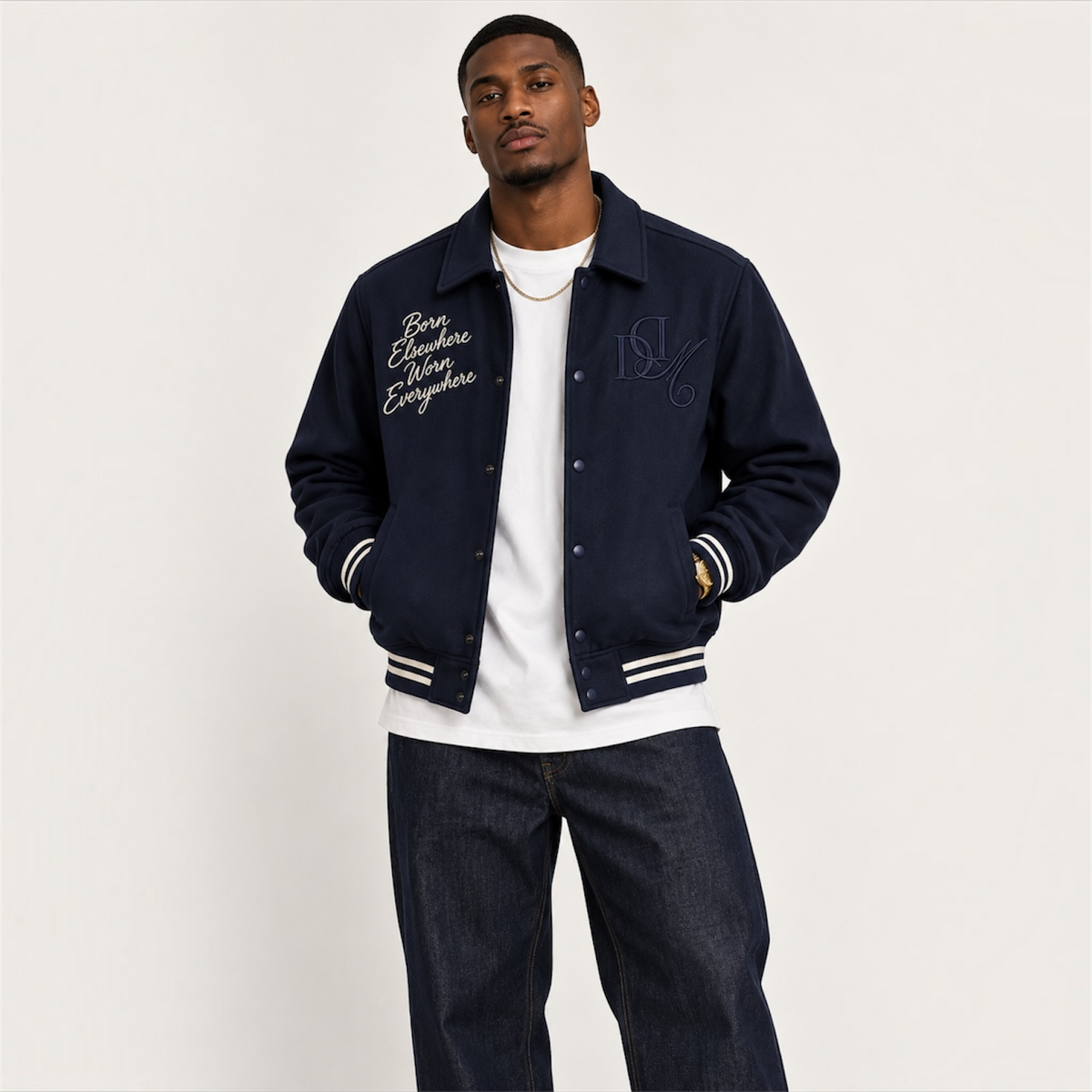 Front editorial model view of DonDeMarco navy varsity wool jacket