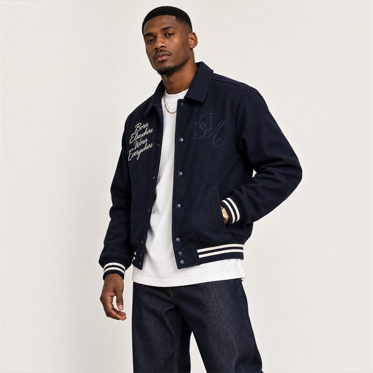 Three-quarter model view of DonDeMarco navy varsity wool jacket
