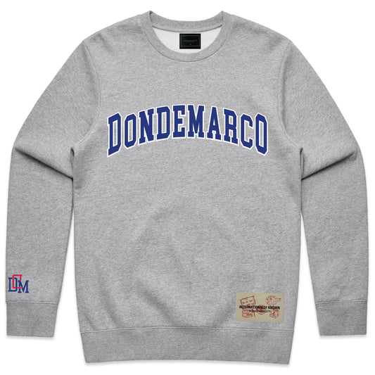 A gray DonDeMarco crew neck sweatshirt with the brand name written across the front in blue letters.